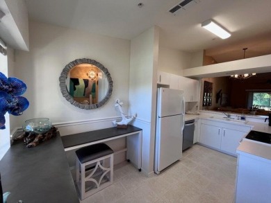 GOLF INCLUDED with this bright end unit condo in Cypress Woods on Cypress Woods Golf and Country Club in Florida - for sale on GolfHomes.com, golf home, golf lot