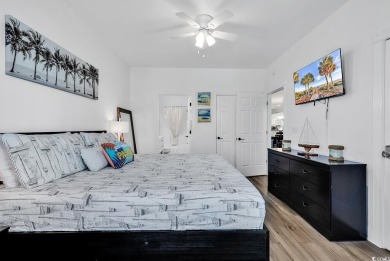 This elegant condo and well positioned maintenance free coastal on Myrtlewood Golf Course and Club  in South Carolina - for sale on GolfHomes.com, golf home, golf lot