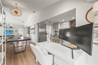 Enjoy the ease of maintenance-free living in the highly on Palm Aire Country Club of Sarasota in Florida - for sale on GolfHomes.com, golf home, golf lot
