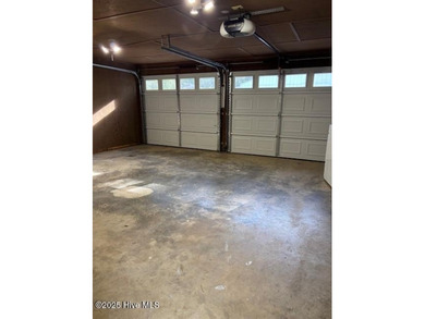 Discover this stunning 3-bedroom, 3-bath townhouse with a 2-car on Woodlake Country Club in North Carolina - for sale on GolfHomes.com, golf home, golf lot