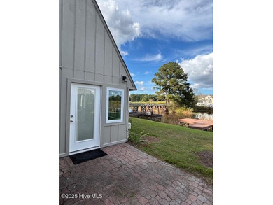 Discover this stunning 3-bedroom, 3-bath townhouse with a 2-car on Woodlake Country Club in North Carolina - for sale on GolfHomes.com, golf home, golf lot