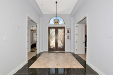 Come see this beautiful well built home with a large open on University Park Country Club in Florida - for sale on GolfHomes.com, golf home, golf lot