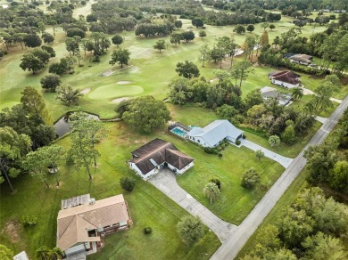 Awesome pool home in the lake and golf community of Indian Lake on Indian Lake Estates Golf and Country Club in Florida - for sale on GolfHomes.com, golf home, golf lot