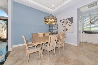 Come see this beautiful well built home with a large open on University Park Country Club in Florida - for sale on GolfHomes.com, golf home, golf lot
