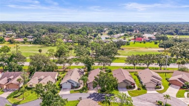 Enjoy the ease of maintenance-free living in the highly on Palm Aire Country Club of Sarasota in Florida - for sale on GolfHomes.com, golf home, golf lot