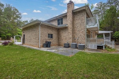 Get ready to fall in love with this stunning all-brick 6-bedroom on Fairfield Plantation Golf and Country Club in Georgia - for sale on GolfHomes.com, golf home, golf lot