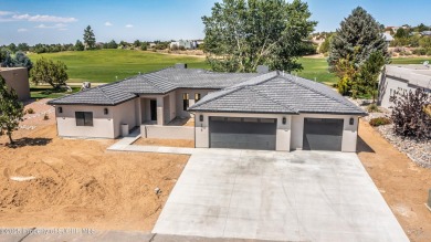 Experience refined living in this stunning 4-bedroom, 3-bath on San Juan Country Club in New Mexico - for sale on GolfHomes.com, golf home, golf lot