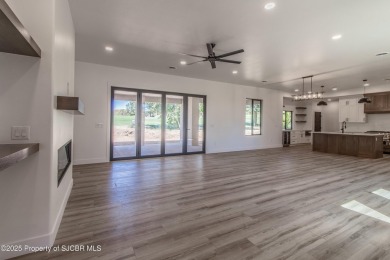 Experience refined living in this stunning 4-bedroom, 3-bath on San Juan Country Club in New Mexico - for sale on GolfHomes.com, golf home, golf lot