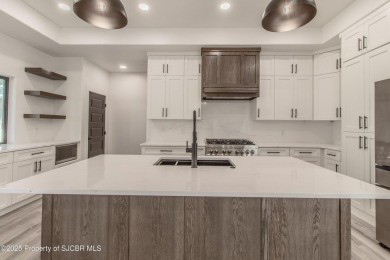 Experience refined living in this stunning 4-bedroom, 3-bath on San Juan Country Club in New Mexico - for sale on GolfHomes.com, golf home, golf lot