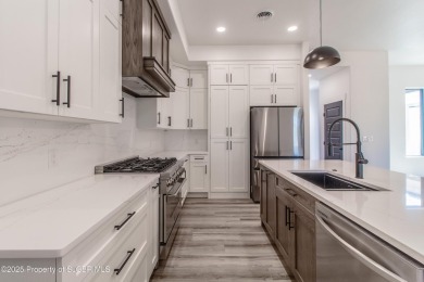 Experience refined living in this stunning 4-bedroom, 3-bath on San Juan Country Club in New Mexico - for sale on GolfHomes.com, golf home, golf lot