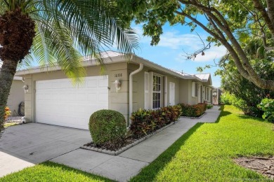 Welcome home to this 2 bedroom, 2 bath, 2 car garage villa in on Monarch Country Club in Florida - for sale on GolfHomes.com, golf home, golf lot