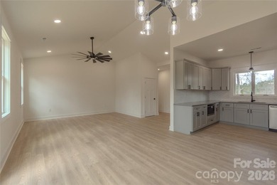 Discover the perfect blend of new construction and lifestyle in on Piney Point Golf Club in North Carolina - for sale on GolfHomes.com, golf home, golf lot