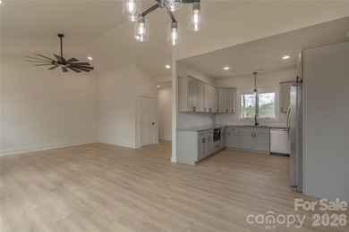 Discover the perfect blend of new construction and lifestyle in on Piney Point Golf Club in North Carolina - for sale on GolfHomes.com, golf home, golf lot