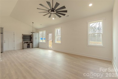 Discover the perfect blend of new construction and lifestyle in on Piney Point Golf Club in North Carolina - for sale on GolfHomes.com, golf home, golf lot