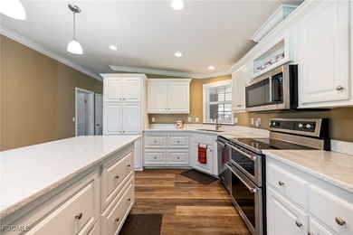 Welcome to your dream home in the prestigious Six Lakes Country on Six Lakes Country Club in Florida - for sale on GolfHomes.com, golf home, golf lot