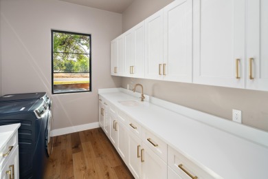 This exquisite Hill Country modern in exclusive Applehead sits on Apple Rock Golf Course - Horseshoe Bay in Texas - for sale on GolfHomes.com, golf home, golf lot