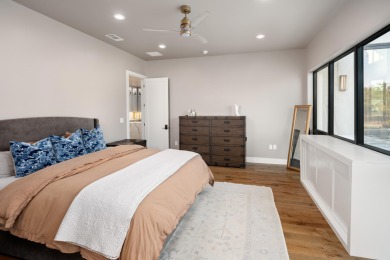 This exquisite Hill Country modern in exclusive Applehead sits on Apple Rock Golf Course - Horseshoe Bay in Texas - for sale on GolfHomes.com, golf home, golf lot