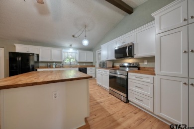 Welcome to this beautifully maintained and updated home in the on Hide-A-Way Lake Golf Course in Texas - for sale on GolfHomes.com, golf home, golf lot