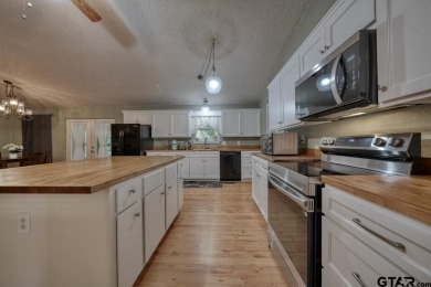 Welcome to this beautifully maintained and updated home in the on Hide-A-Way Lake Golf Course in Texas - for sale on GolfHomes.com, golf home, golf lot