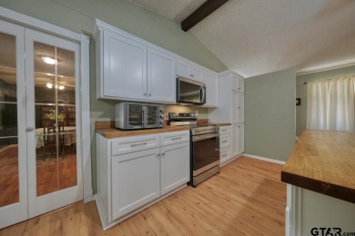 Welcome to this beautifully maintained and updated home in the on Hide-A-Way Lake Golf Course in Texas - for sale on GolfHomes.com, golf home, golf lot