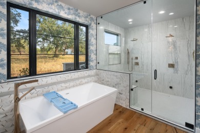This exquisite Hill Country modern in exclusive Applehead sits on Apple Rock Golf Course - Horseshoe Bay in Texas - for sale on GolfHomes.com, golf home, golf lot