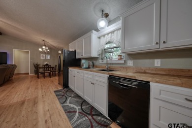 Welcome to this beautifully maintained and updated home in the on Hide-A-Way Lake Golf Course in Texas - for sale on GolfHomes.com, golf home, golf lot