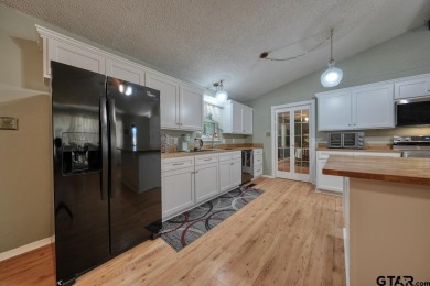 Welcome to this beautifully maintained and updated home in the on Hide-A-Way Lake Golf Course in Texas - for sale on GolfHomes.com, golf home, golf lot