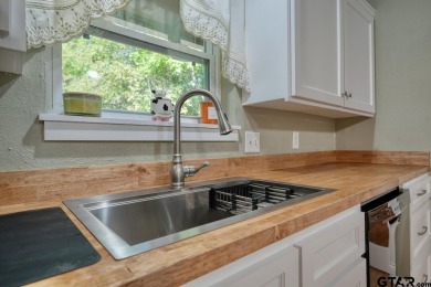 Welcome to this beautifully maintained and updated home in the on Hide-A-Way Lake Golf Course in Texas - for sale on GolfHomes.com, golf home, golf lot