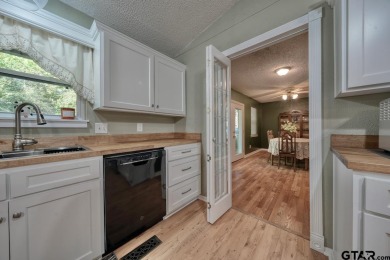 Welcome to this beautifully maintained and updated home in the on Hide-A-Way Lake Golf Course in Texas - for sale on GolfHomes.com, golf home, golf lot