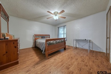 Welcome to this beautifully maintained and updated home in the on Hide-A-Way Lake Golf Course in Texas - for sale on GolfHomes.com, golf home, golf lot