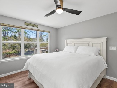 Elegant Coastal Living in Bethany Bay Discover timeless coastal on Bethany Bay Golf Club in Delaware - for sale on GolfHomes.com, golf home, golf lot
