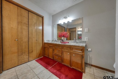 Welcome to this beautifully maintained and updated home in the on Hide-A-Way Lake Golf Course in Texas - for sale on GolfHomes.com, golf home, golf lot