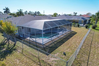 Easy Florida living is found within the walls of this charming on Rotonda Golf and Country Club - Long Marsh  in Florida - for sale on GolfHomes.com, golf home, golf lot