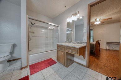 Welcome to this beautifully maintained and updated home in the on Hide-A-Way Lake Golf Course in Texas - for sale on GolfHomes.com, golf home, golf lot