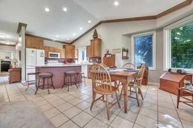 Elegant townhome overlooking Emerald Hills Golf Course featuring on Emerald Hills Golf Club in Iowa - for sale on GolfHomes.com, golf home, golf lot