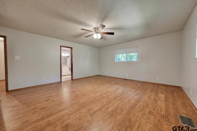 Welcome to this beautifully maintained and updated home in the on Hide-A-Way Lake Golf Course in Texas - for sale on GolfHomes.com, golf home, golf lot