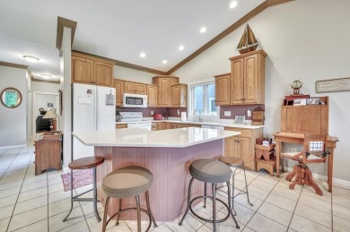 Elegant townhome overlooking Emerald Hills Golf Course featuring on Emerald Hills Golf Club in Iowa - for sale on GolfHomes.com, golf home, golf lot