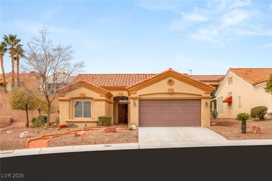 This beautifully updated Sun City Summerlin home has an open on Highland Falls Golf Club in Nevada - for sale on GolfHomes.com, golf home, golf lot