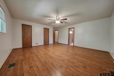 Welcome to this beautifully maintained and updated home in the on Hide-A-Way Lake Golf Course in Texas - for sale on GolfHomes.com, golf home, golf lot