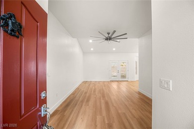 This beautifully updated Sun City Summerlin home has an open on Highland Falls Golf Club in Nevada - for sale on GolfHomes.com, golf home, golf lot