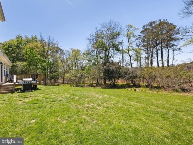 Elegant Coastal Living in Bethany Bay Discover timeless coastal on Bethany Bay Golf Club in Delaware - for sale on GolfHomes.com, golf home, golf lot