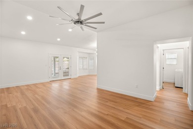 This beautifully updated Sun City Summerlin home has an open on Highland Falls Golf Club in Nevada - for sale on GolfHomes.com, golf home, golf lot