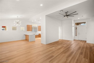 This beautifully updated Sun City Summerlin home has an open on Highland Falls Golf Club in Nevada - for sale on GolfHomes.com, golf home, golf lot