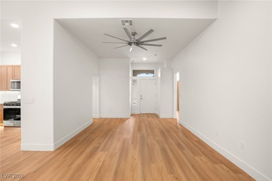 This beautifully updated Sun City Summerlin home has an open on Highland Falls Golf Club in Nevada - for sale on GolfHomes.com, golf home, golf lot