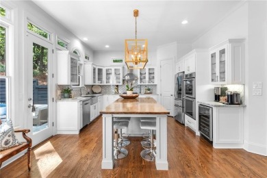 Welcome to Aerie Court, a beautifully remodeled four-sided brick on Cherokee Town and Country Club in Georgia - for sale on GolfHomes.com, golf home, golf lot