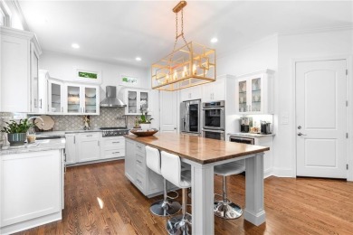 Welcome to Aerie Court, a beautifully remodeled four-sided brick on Cherokee Town and Country Club in Georgia - for sale on GolfHomes.com, golf home, golf lot