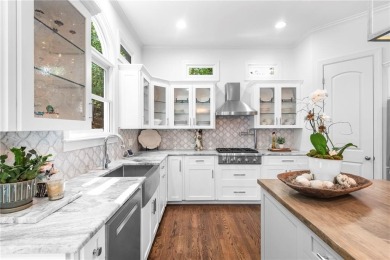 Welcome to Aerie Court, a beautifully remodeled four-sided brick on Cherokee Town and Country Club in Georgia - for sale on GolfHomes.com, golf home, golf lot