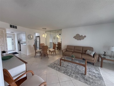 Reduce price for this beautiful condo 2 bedrooms, 2 bathrooms in on Sunrise Lakes Phase III in Florida - for sale on GolfHomes.com, golf home, golf lot