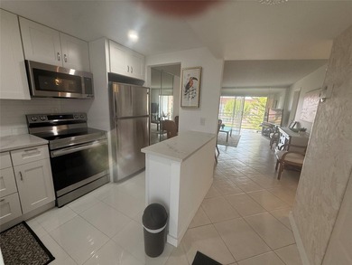 Reduce price for this beautiful condo 2 bedrooms, 2 bathrooms in on Sunrise Lakes Phase III in Florida - for sale on GolfHomes.com, golf home, golf lot