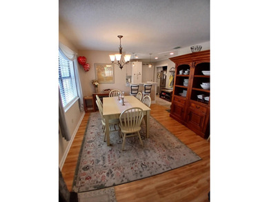 Check out this beautifully updated 2-bedroom, 2-bath home in the on Heron Point Golf Club in South Carolina - for sale on GolfHomes.com, golf home, golf lot